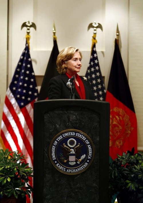 U.S. State Secretary Hillary Clinton listens during a news conference at the U.S. embassy in Kabul
